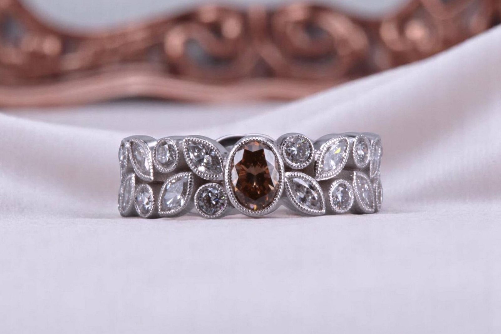 Non-traditional rootbeer diamond floral ring for couples in Carlsbad